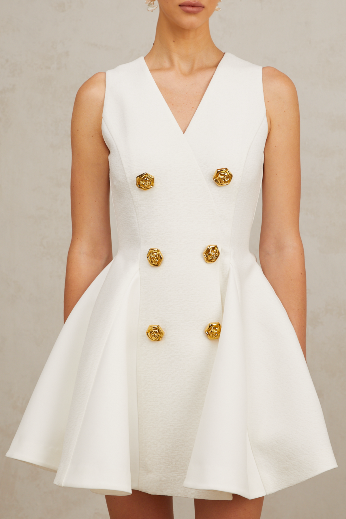Élise pleated peplum-hem sleeveless mini dress