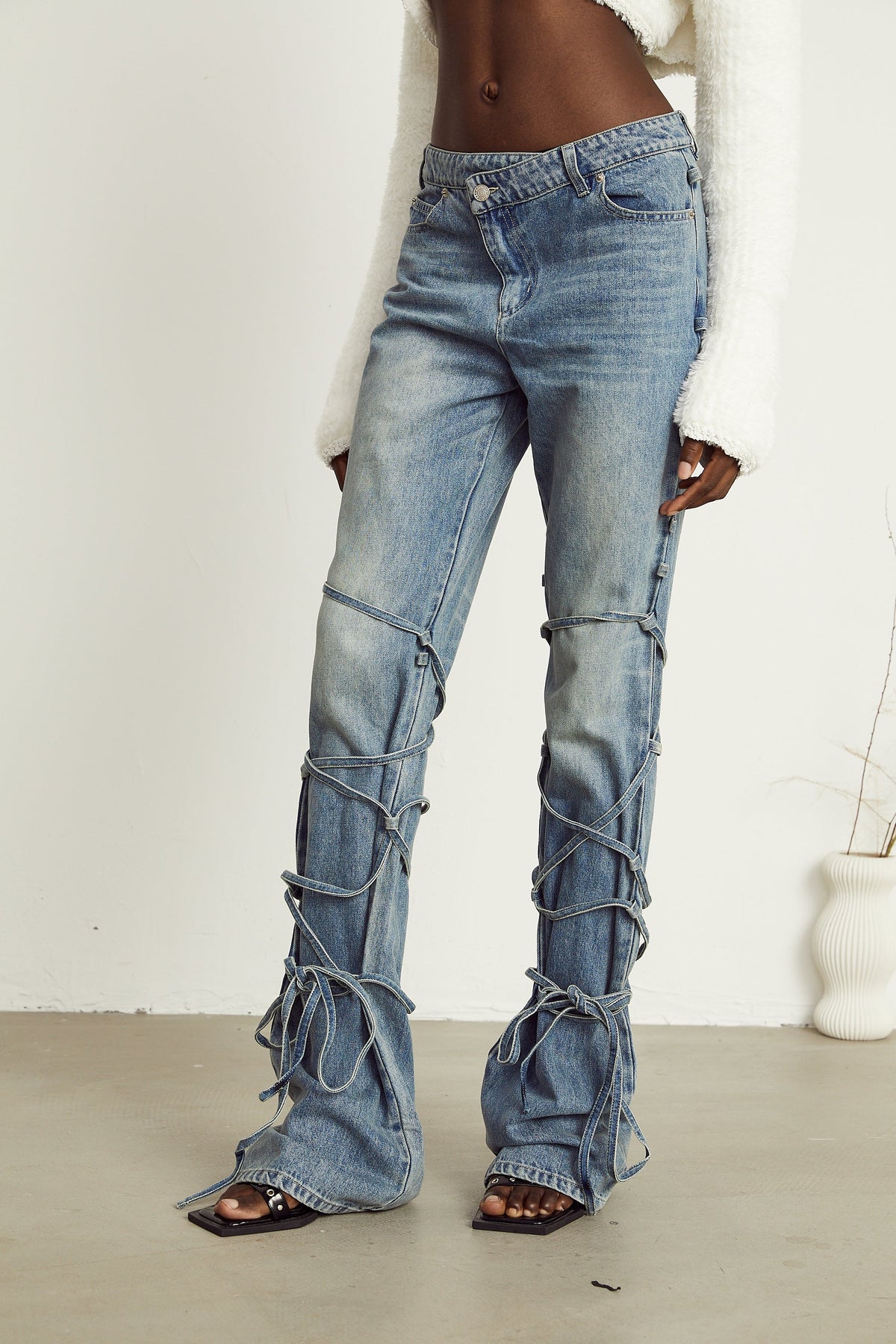 Géraldine strap-detail jeans (Final Sale-US Only)