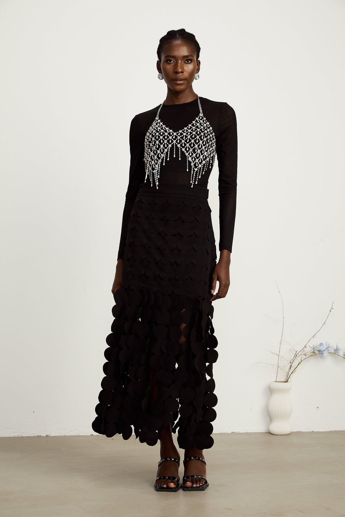 Hanna disc-design fringed maxi skirt in Black