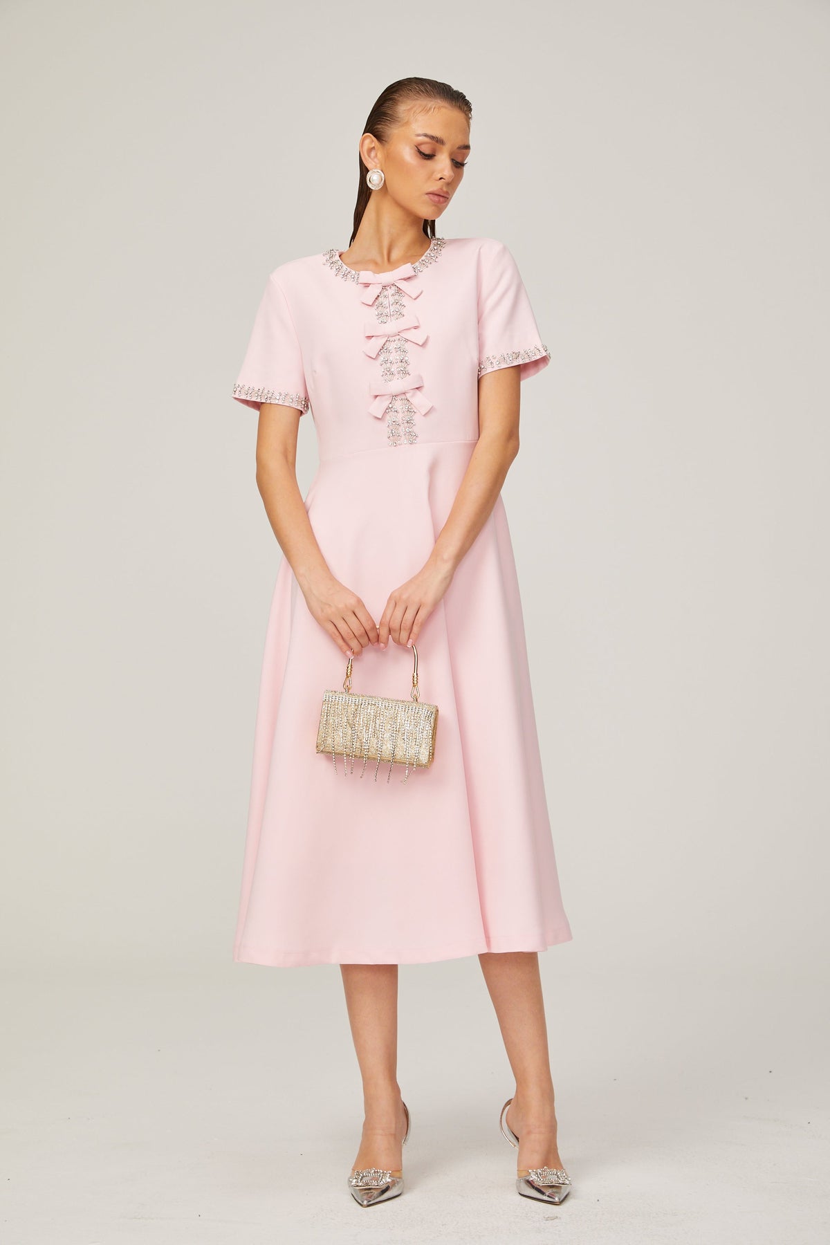 Cassi crystal-accented pink bow midi dress