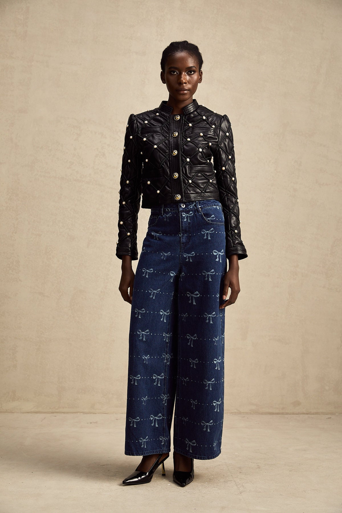 Yvonne bow-motif wide-leg jeans