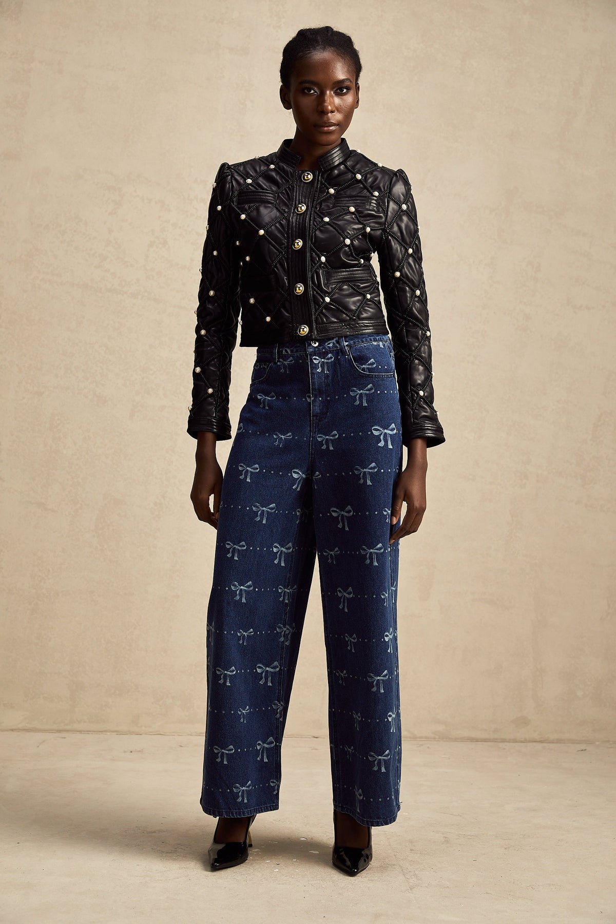 Yvonne bow-motif wide-leg jeans