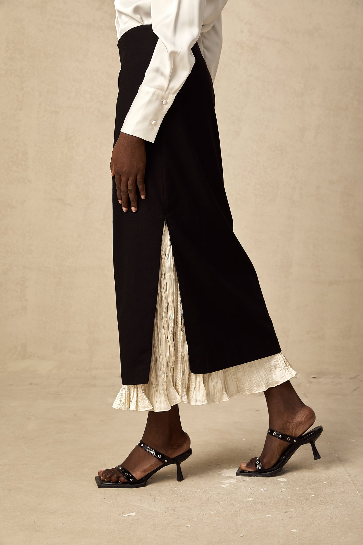 Héloïse color-blocked panelled midi skirt