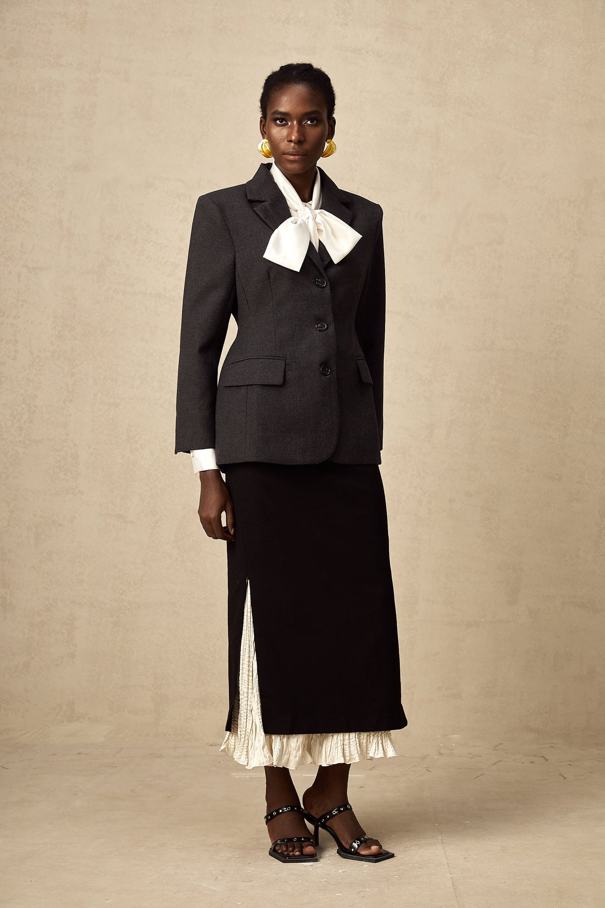Héloïse color-blocked panelled midi skirt