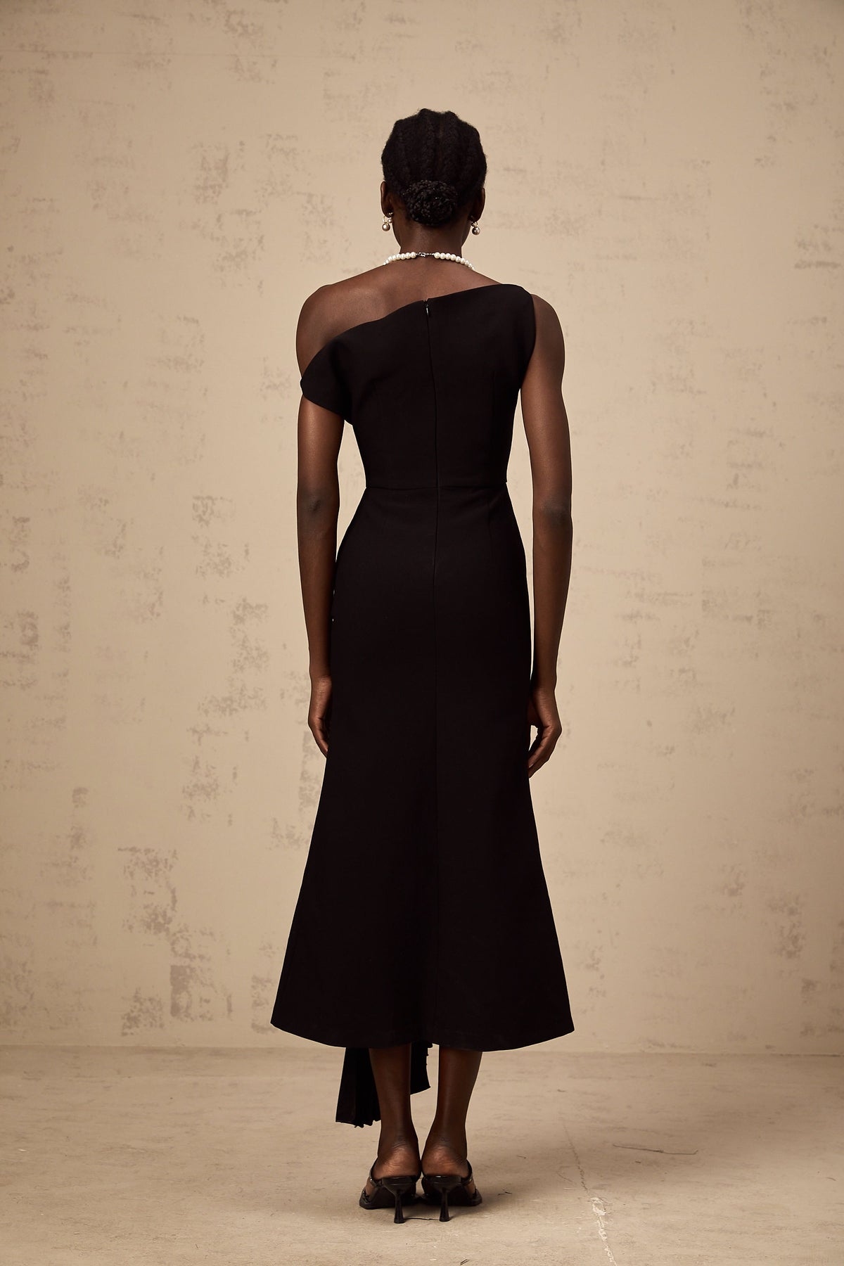 Laurine asymmetrical draped midi dress in Black