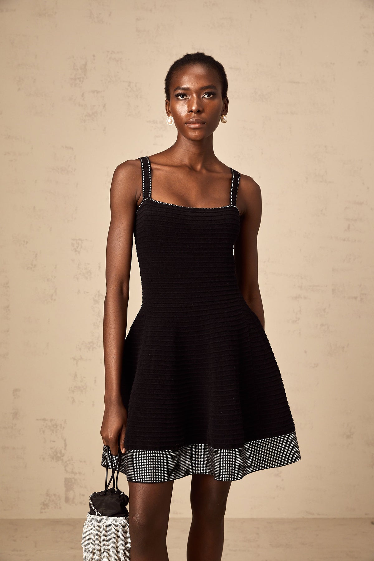 Éliane black studded flared knit mini dress