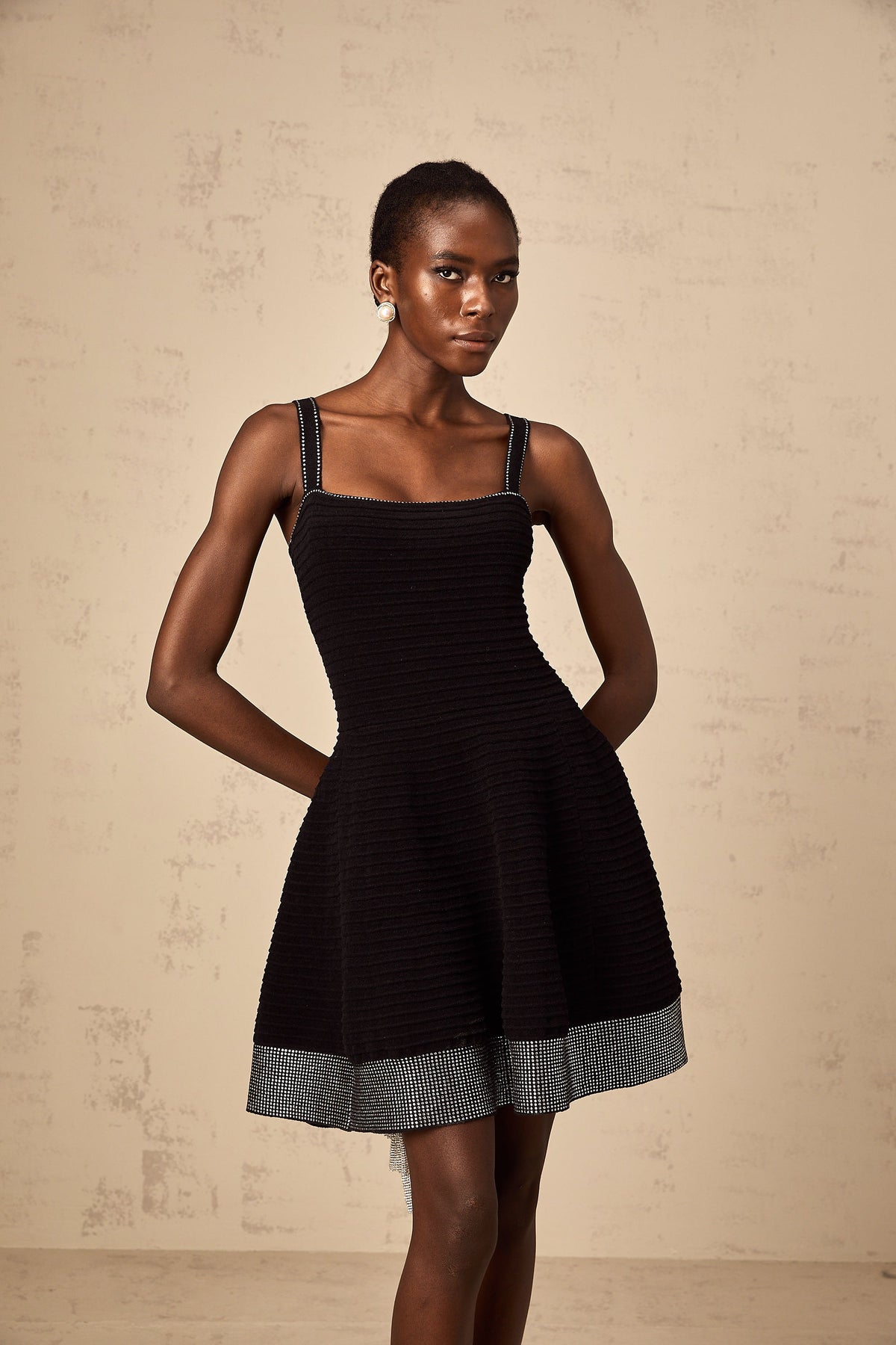 Éliane black studded flared knit mini dress