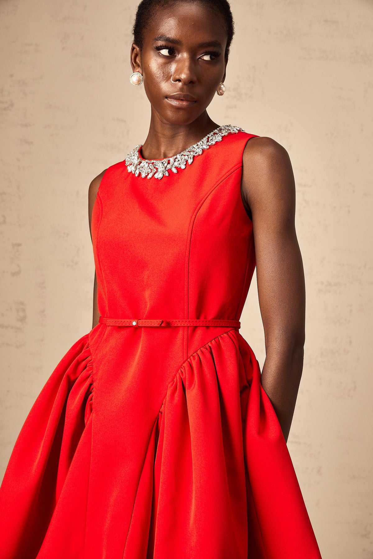 Léonie red embellished pleated mini dress