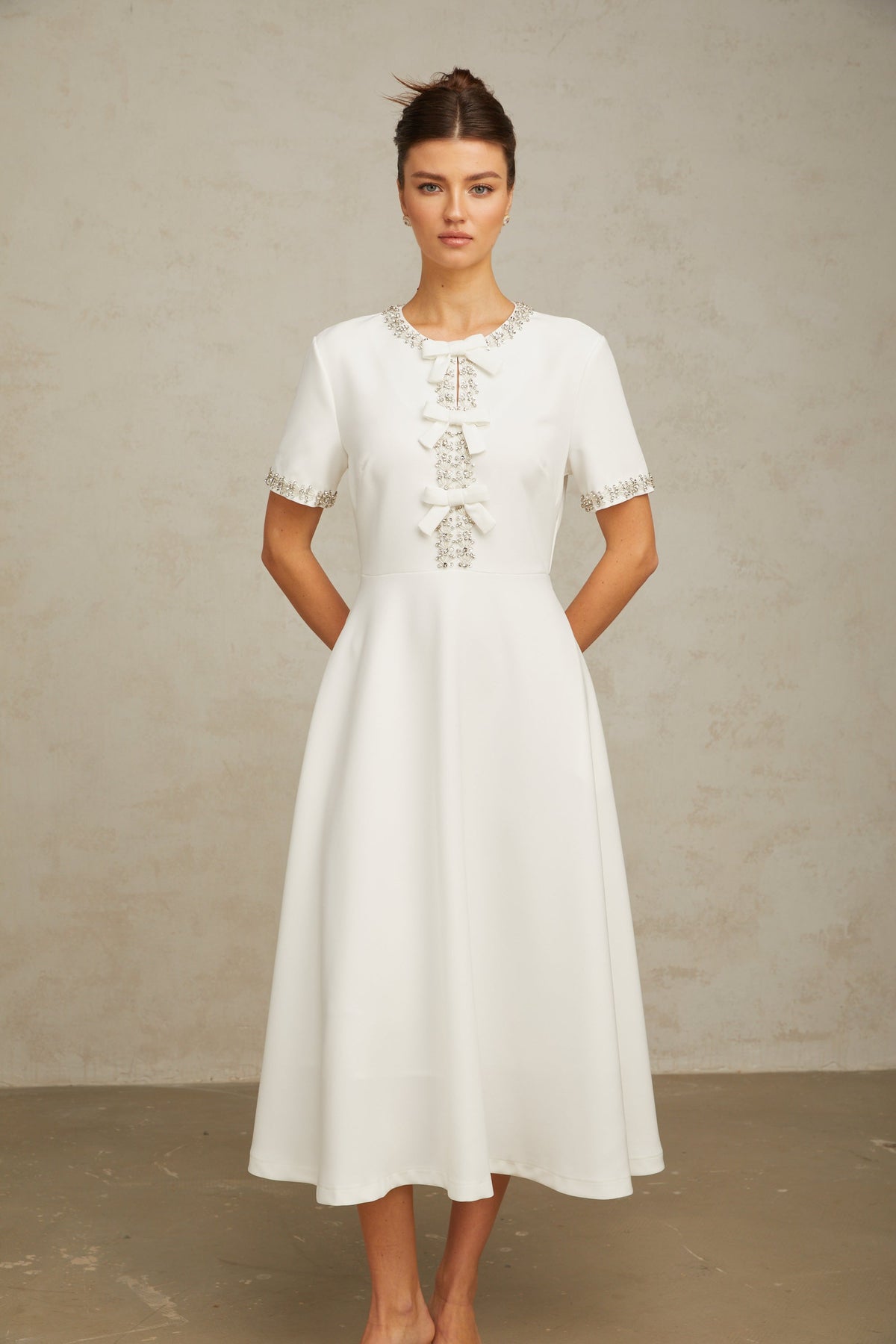 Cassiopeia crystal-accented bow midi dress in White (Final Sale-US Only)