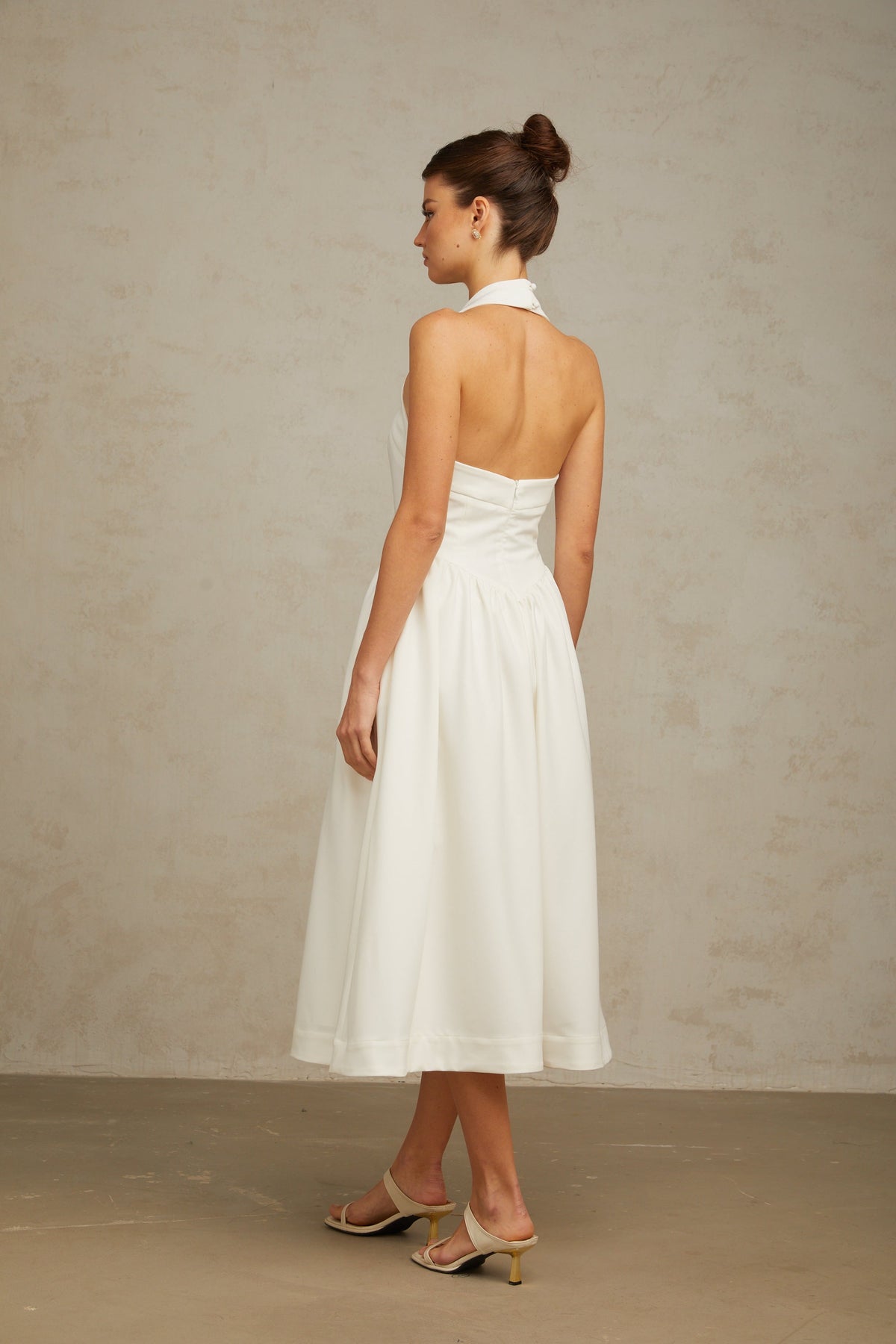 Alizée halterneck pleated midi dress in White