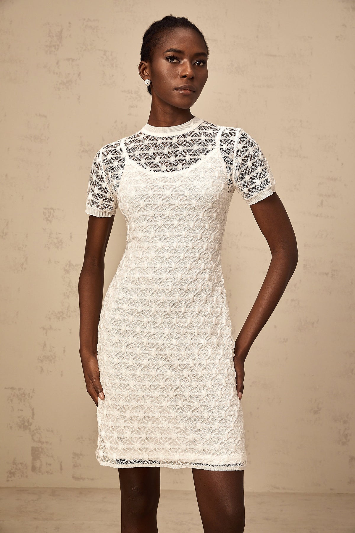 Vanessa white semi-sheer knit mini dress