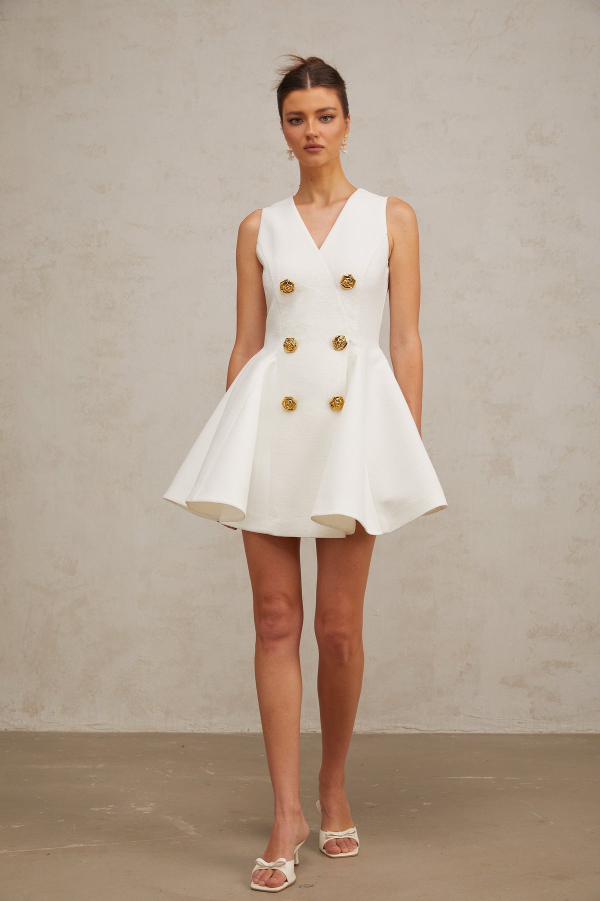 Élise pleated peplum-hem sleeveless mini dress
