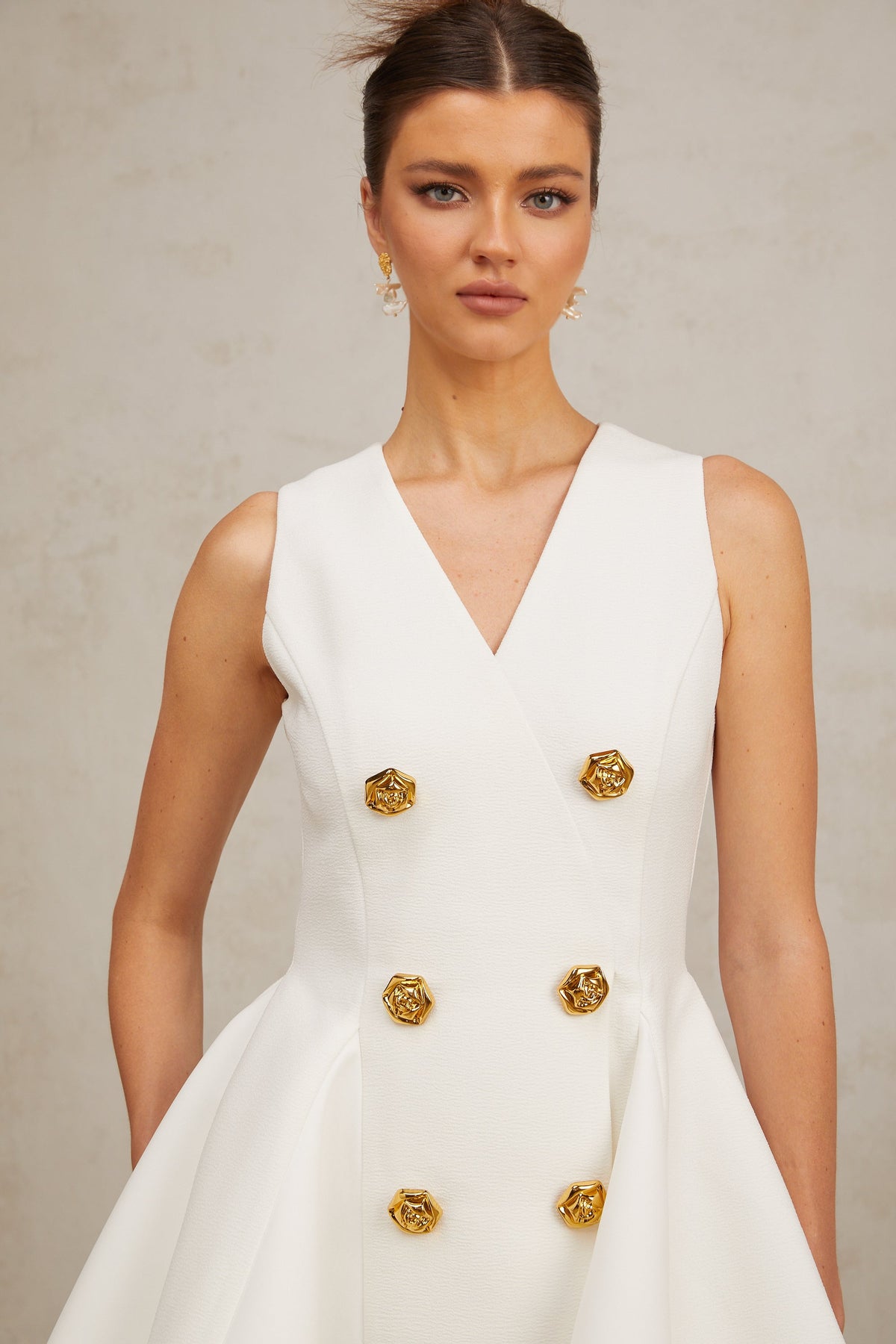 Élise pleated peplum-hem sleeveless mini dress