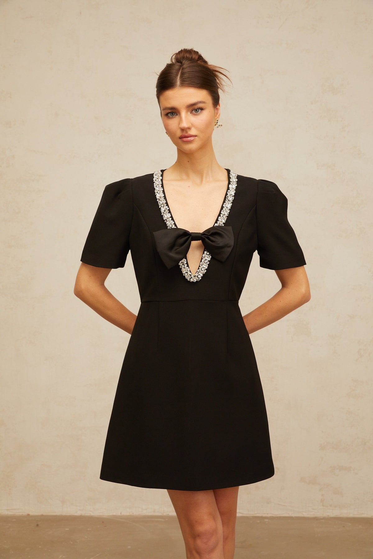 Léa black bow embellished mini dress