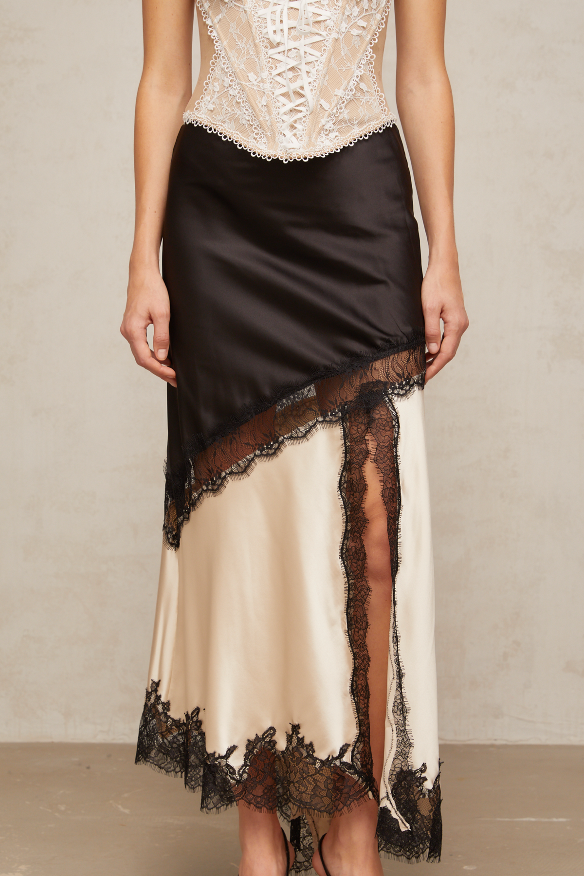 Raphaëlle lace-panel asymmetrical satin skirt