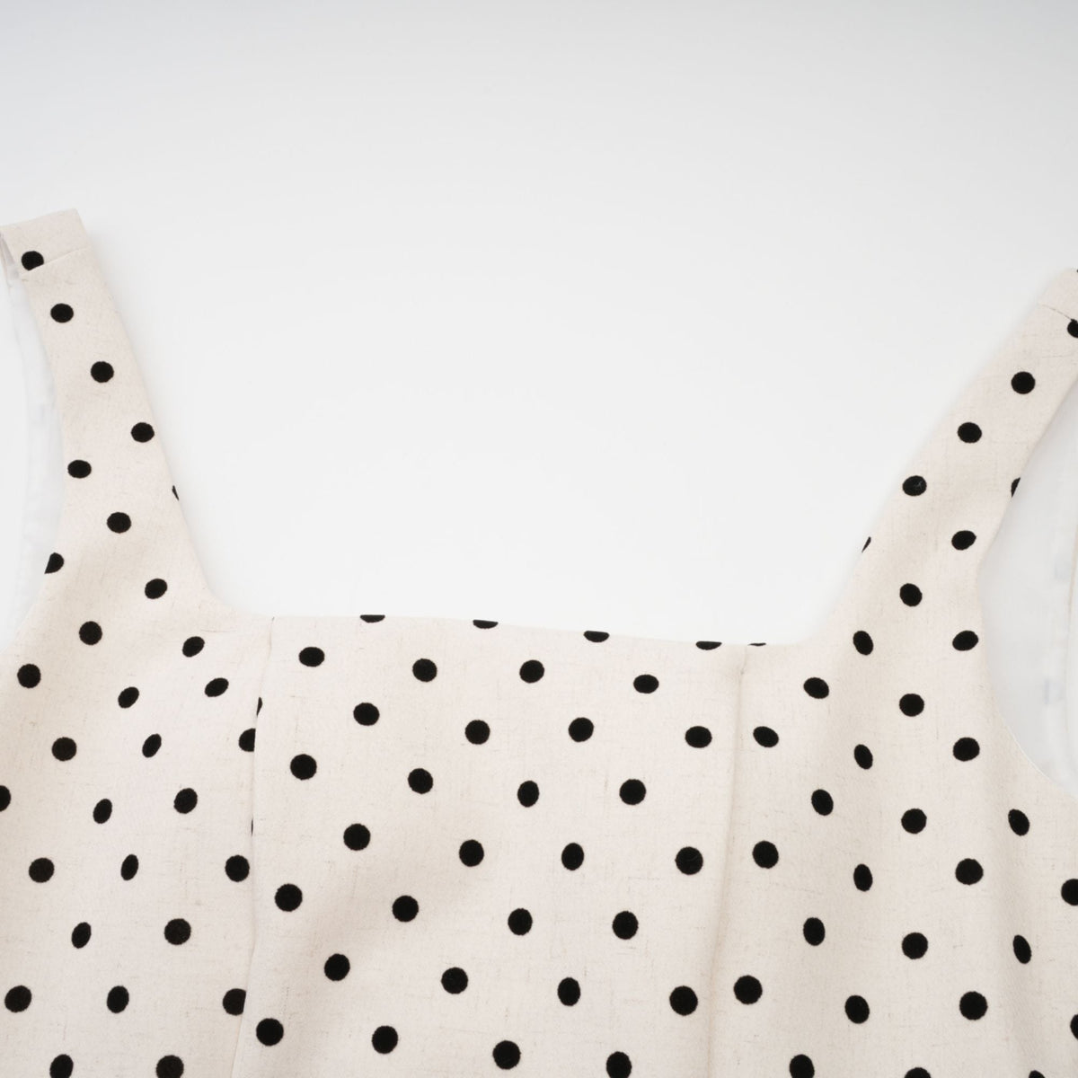 Geneviève neutrals polka-dot puff mini dress