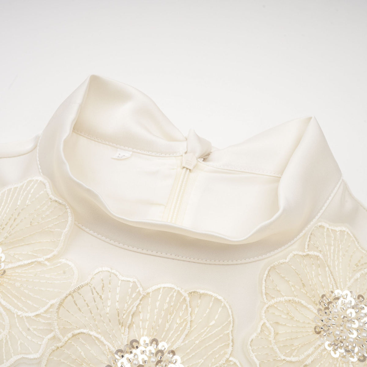 Émilie sleeveless floral-applique midi dress in White