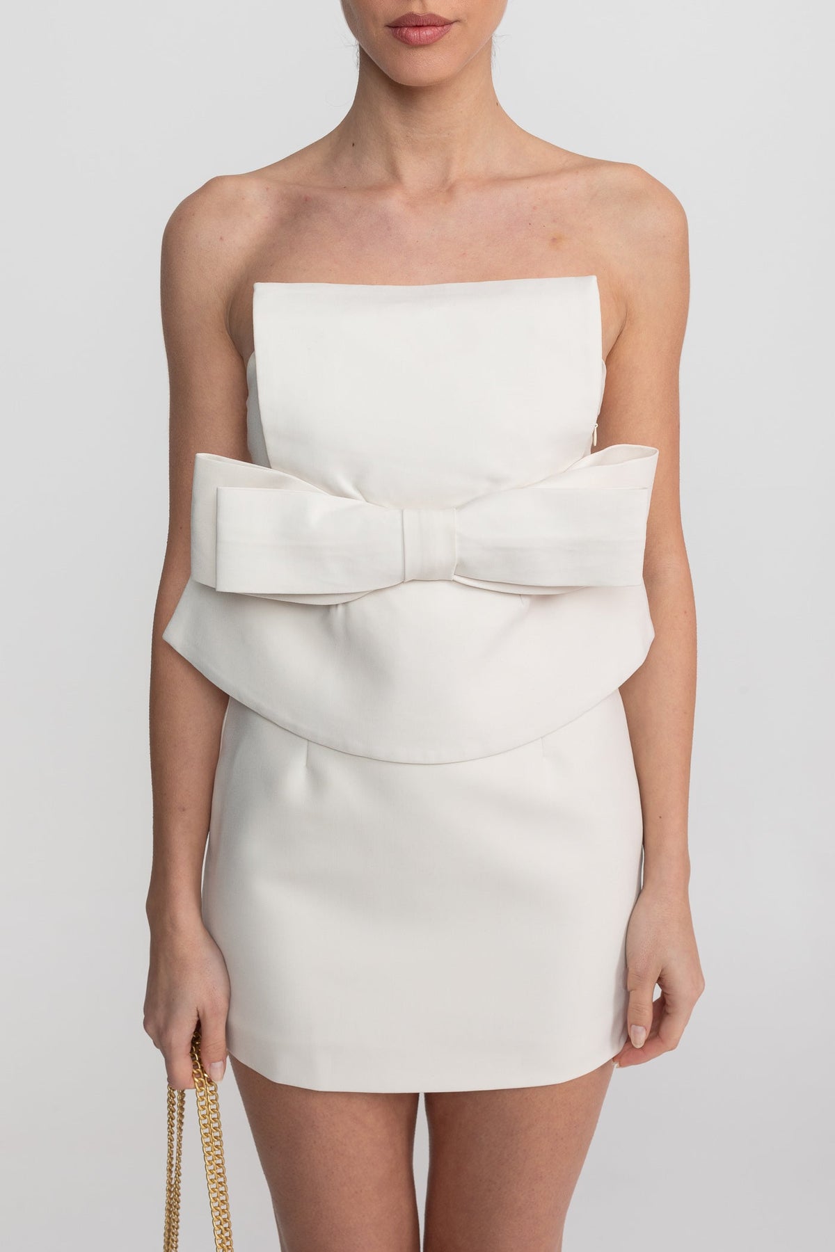 Strapless Mini Dress With Oversized Bow Waist And Peplum Overlay - White