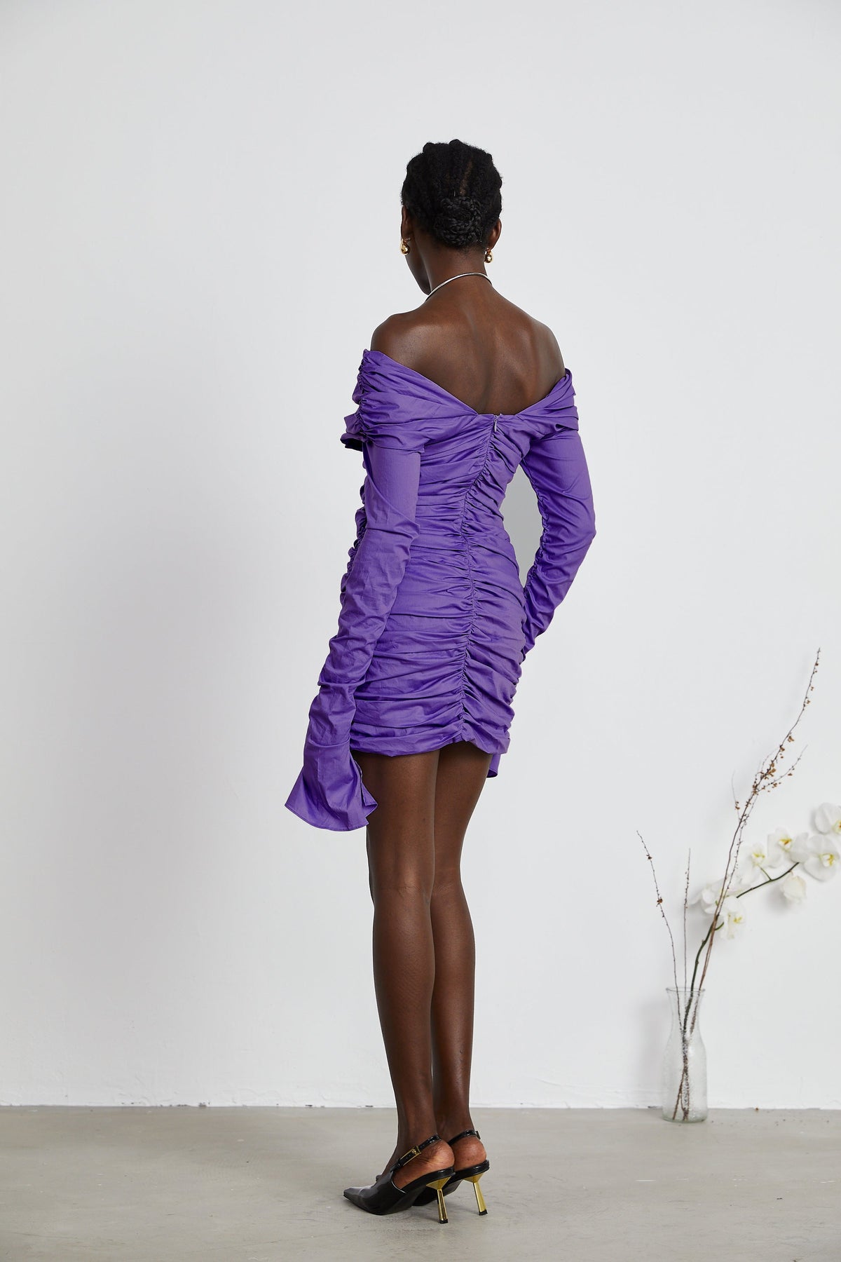 Apolline black off-shoulder ruched mini dress
