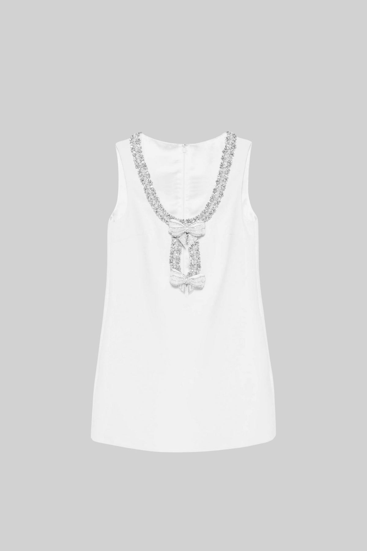 Sleeveless Mini Dress With Intricate Sparkling Neckline And Bow Embellishments - White