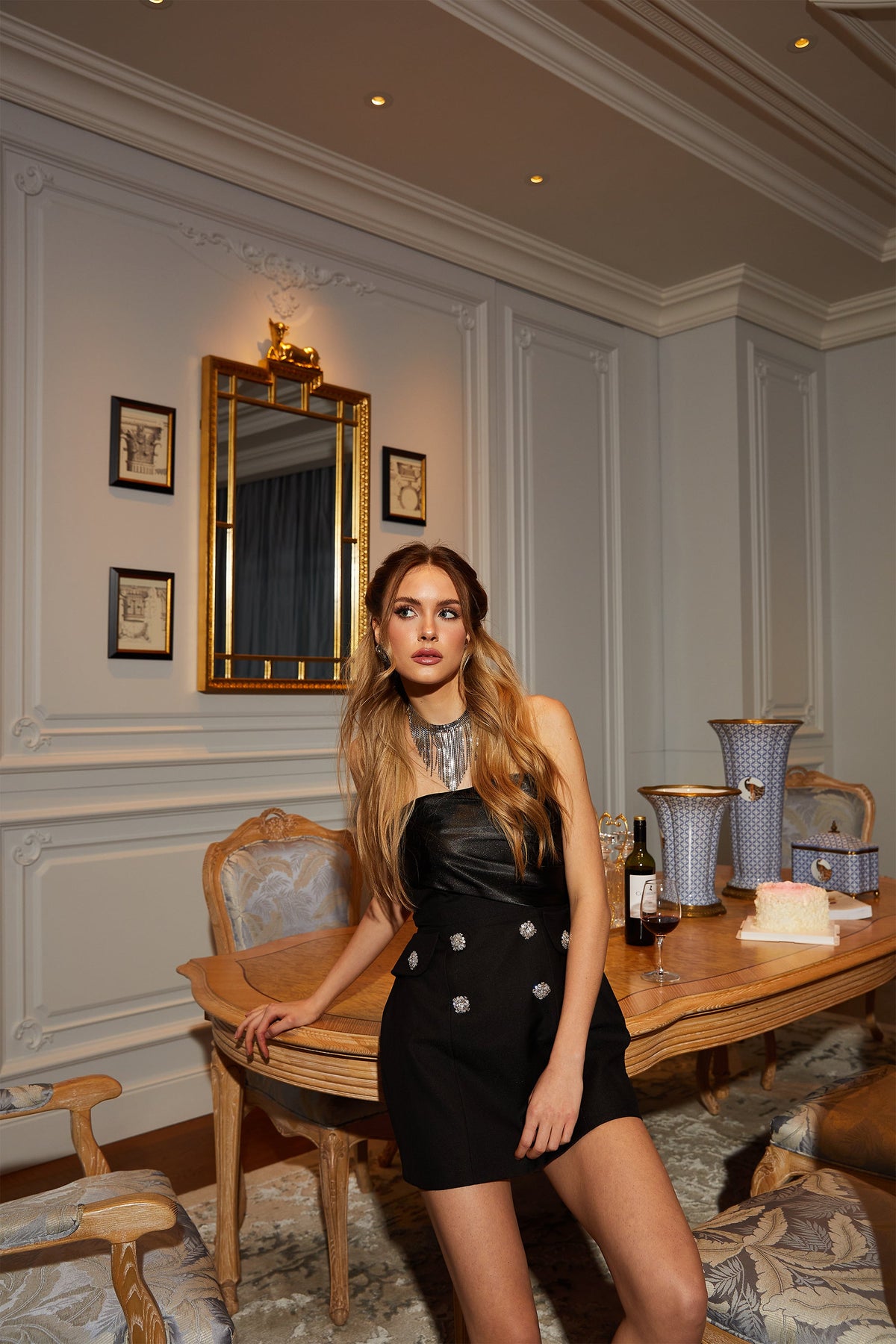 Mealla black crystal-button flared mini dress
