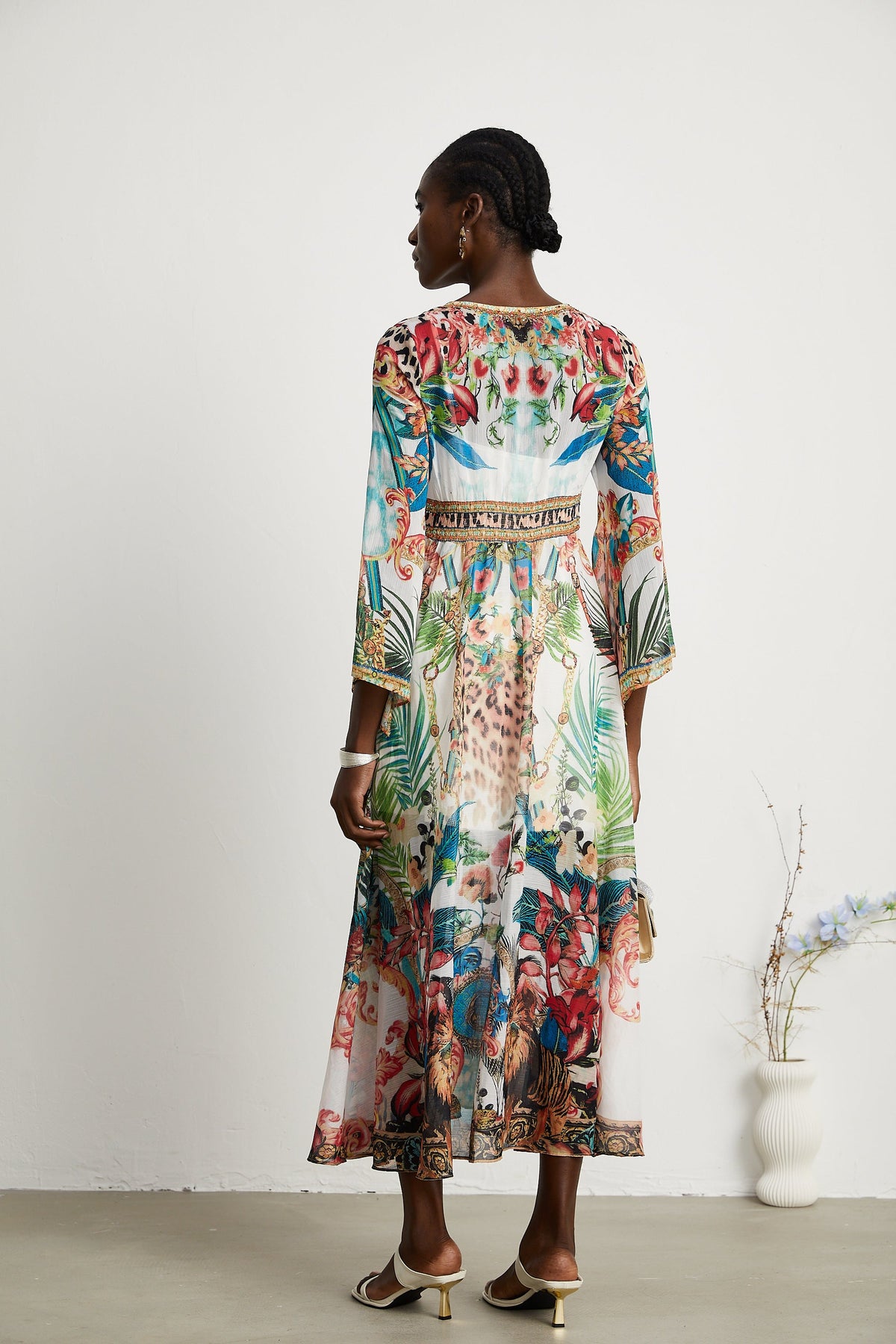 Éva pattern-print V-neck midi dress