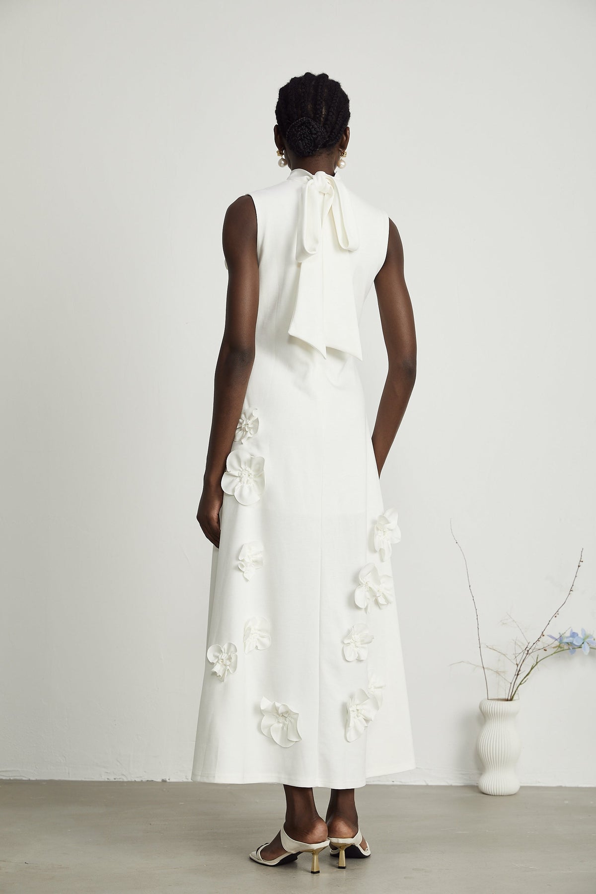 Magali White Sleeveless Maxi Dress with Faux Flower & Bow-Tie Embellishment (Final Sale-US Only)