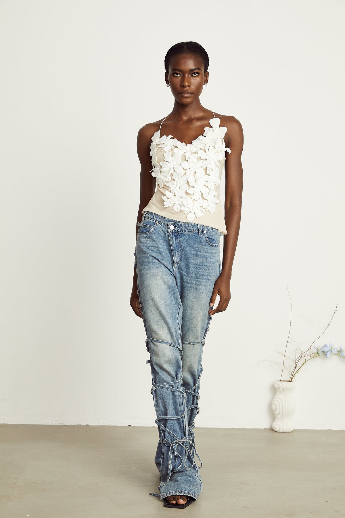 Géraldine strap-detail jeans (Final Sale-US Only)