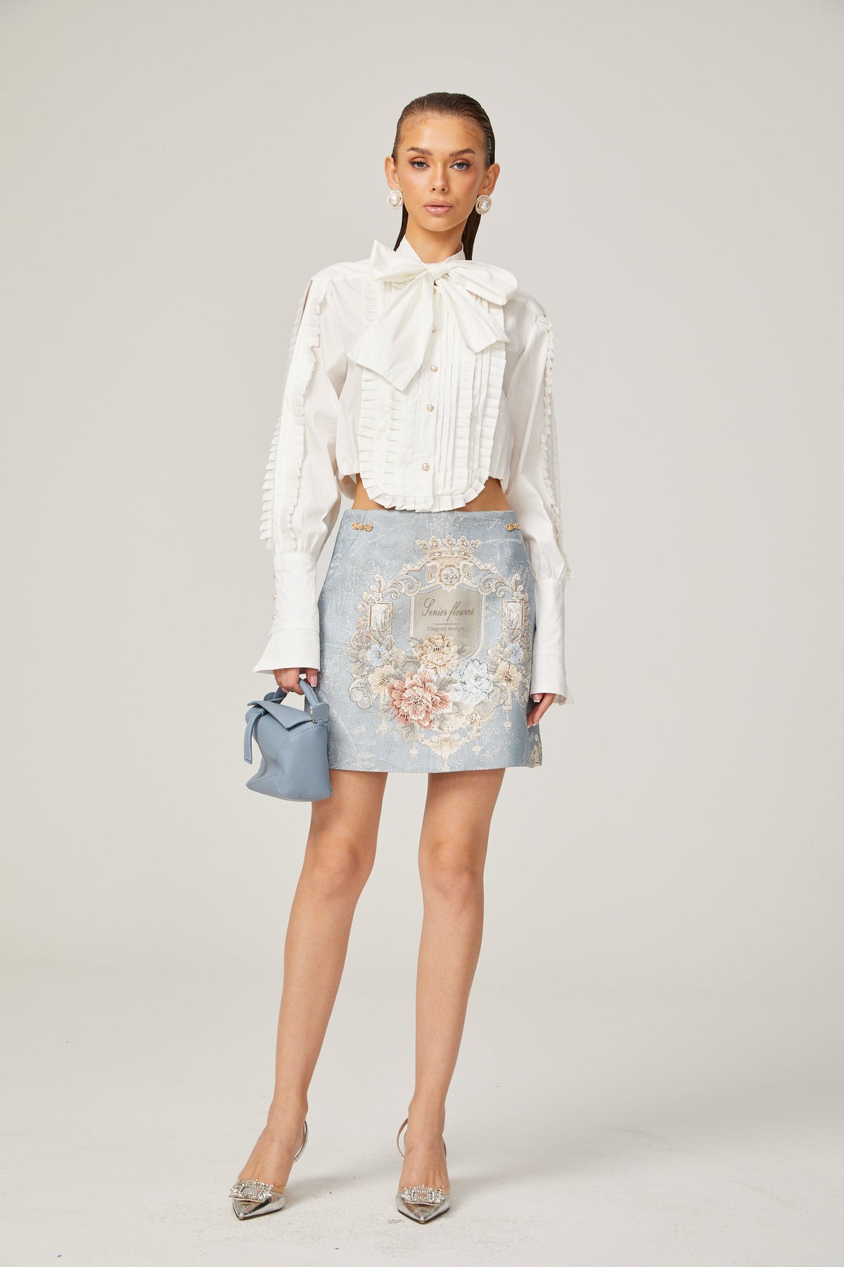 Céleste white pleated scarf-collar shirt
