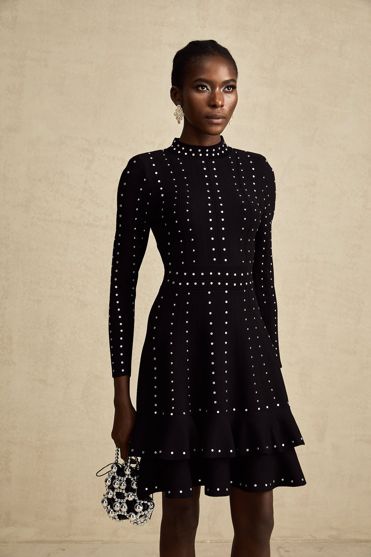 Fabienne black embellished ruffled knitted mini dress