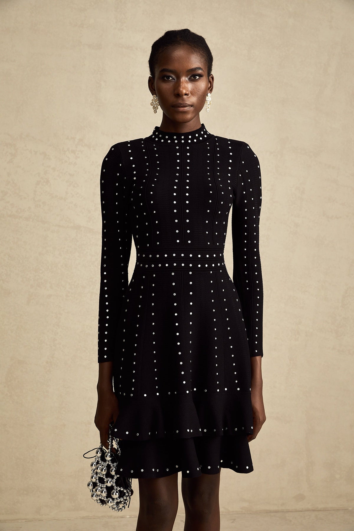 Fabienne black embellished ruffled knitted mini dress