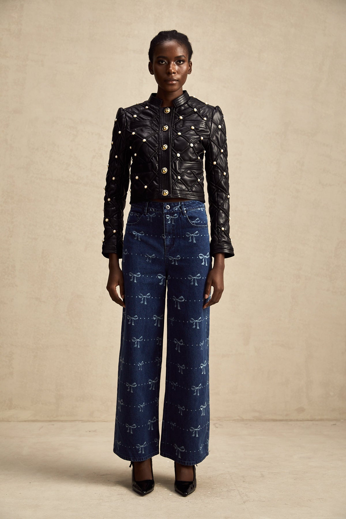 Yvonne bow-motif wide-leg jeans
