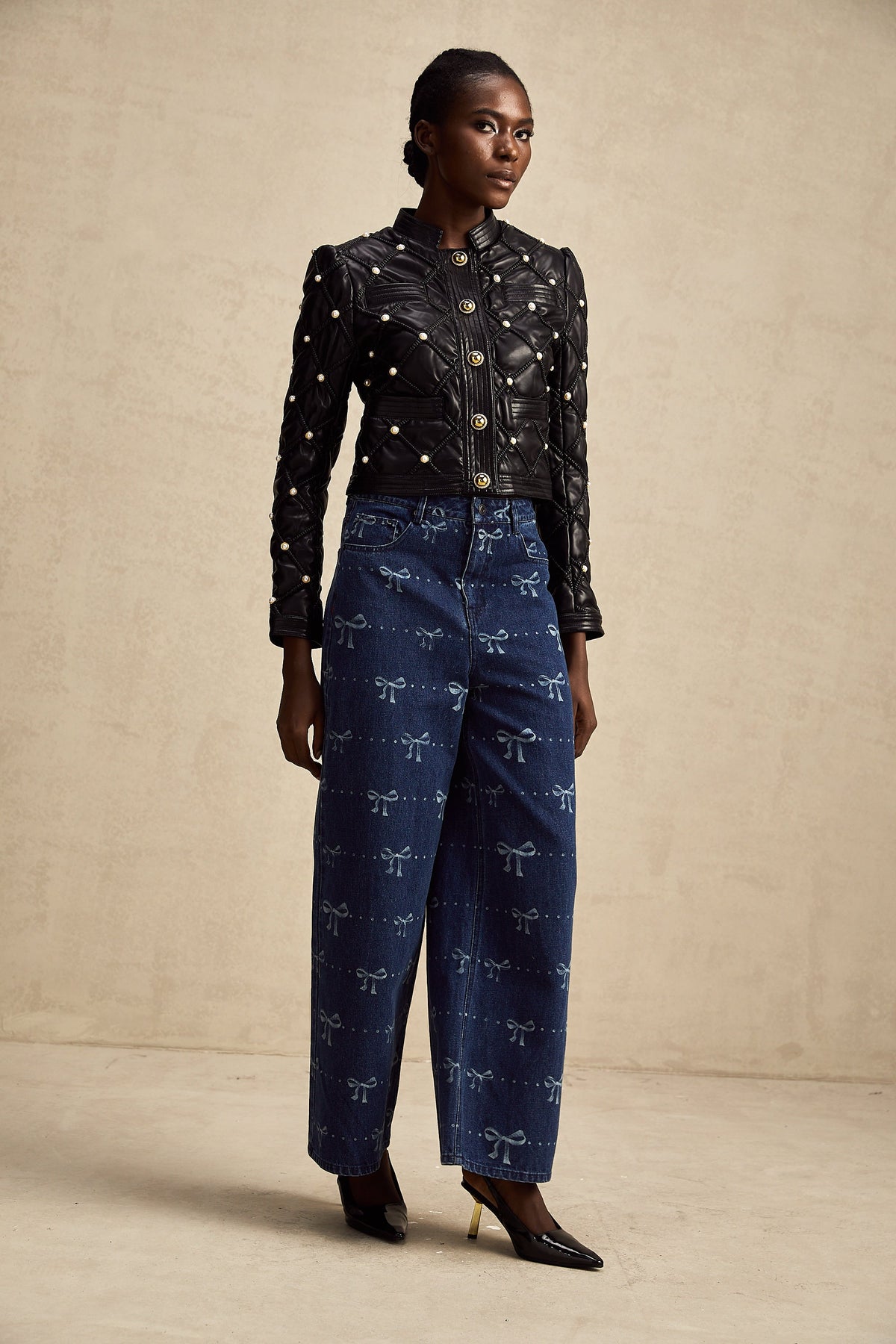 Yvonne bow-motif wide-leg jeans