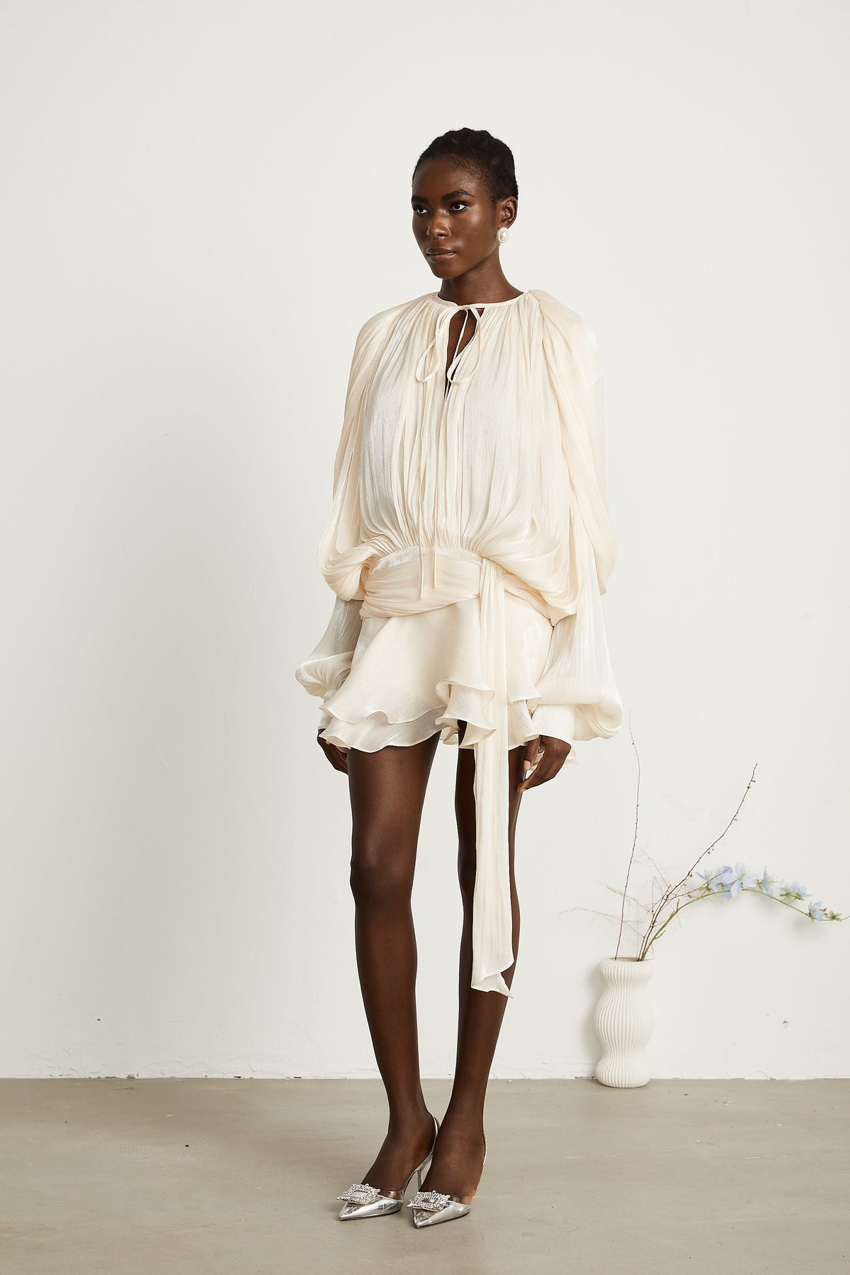 Eugénie fully-pleated ruffled mini dress in Neutrals