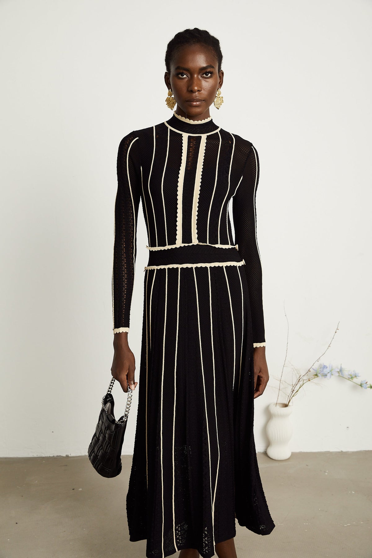 Maëlys black vertical-stripe netted maxi dress