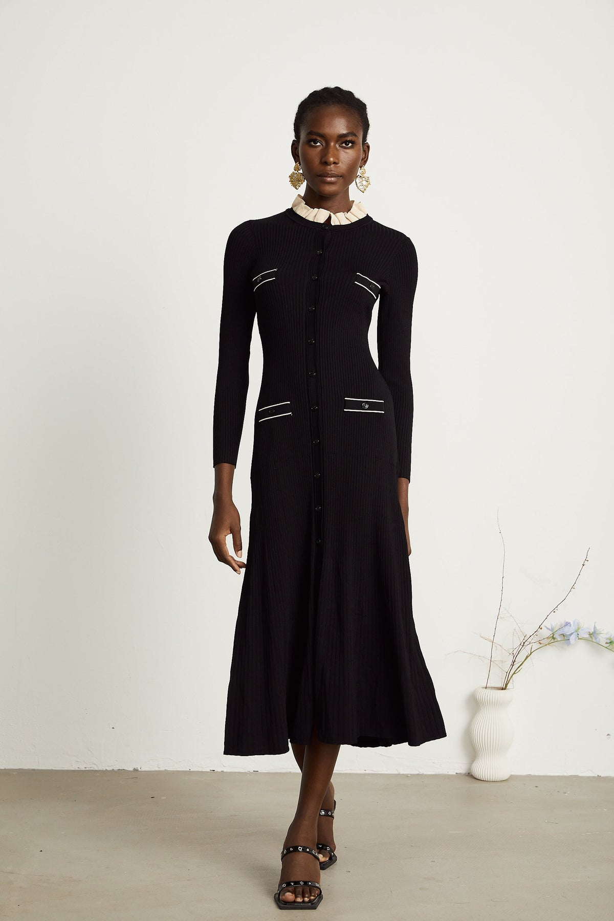 Nadège black ruffled-neck knitted midi dress