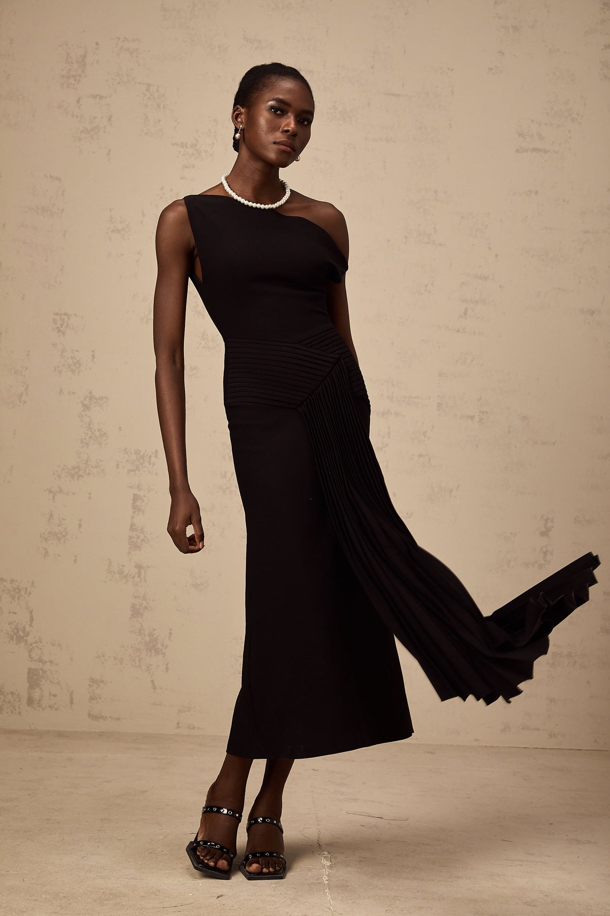 Laurine asymmetrical draped midi dress in Black (Final Sale)