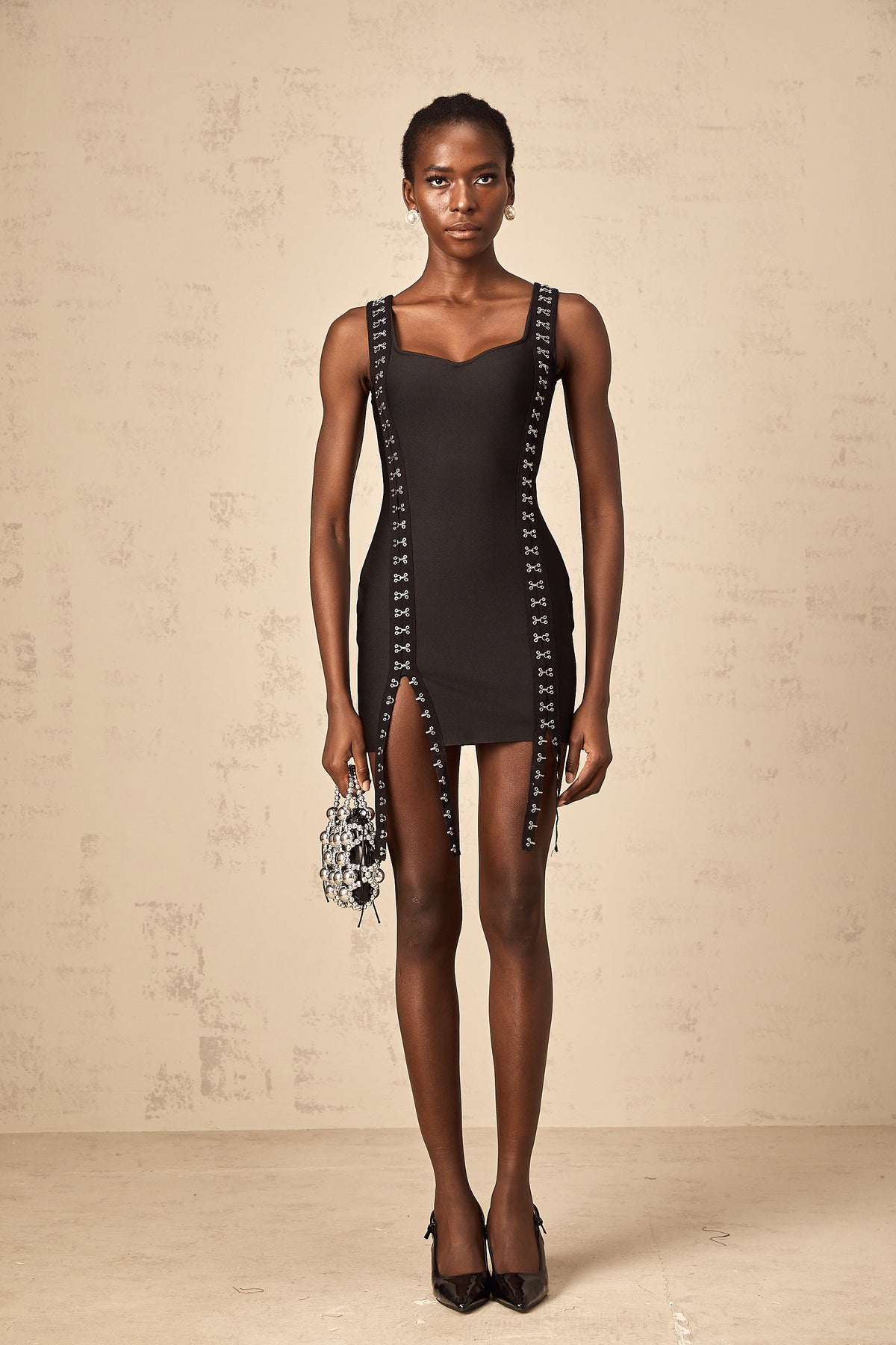 Irina black hook-and-eye bandage mini dress