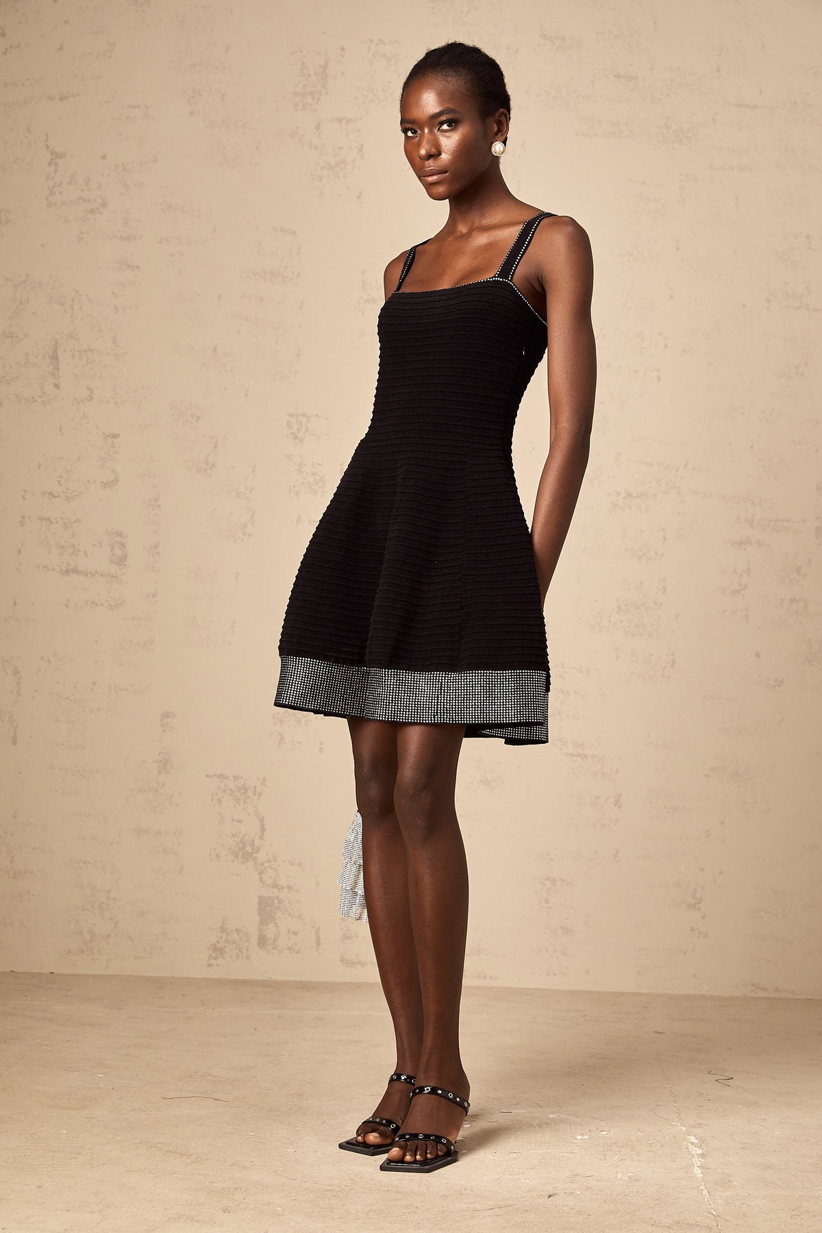 Éliane black studded flared knit mini dress