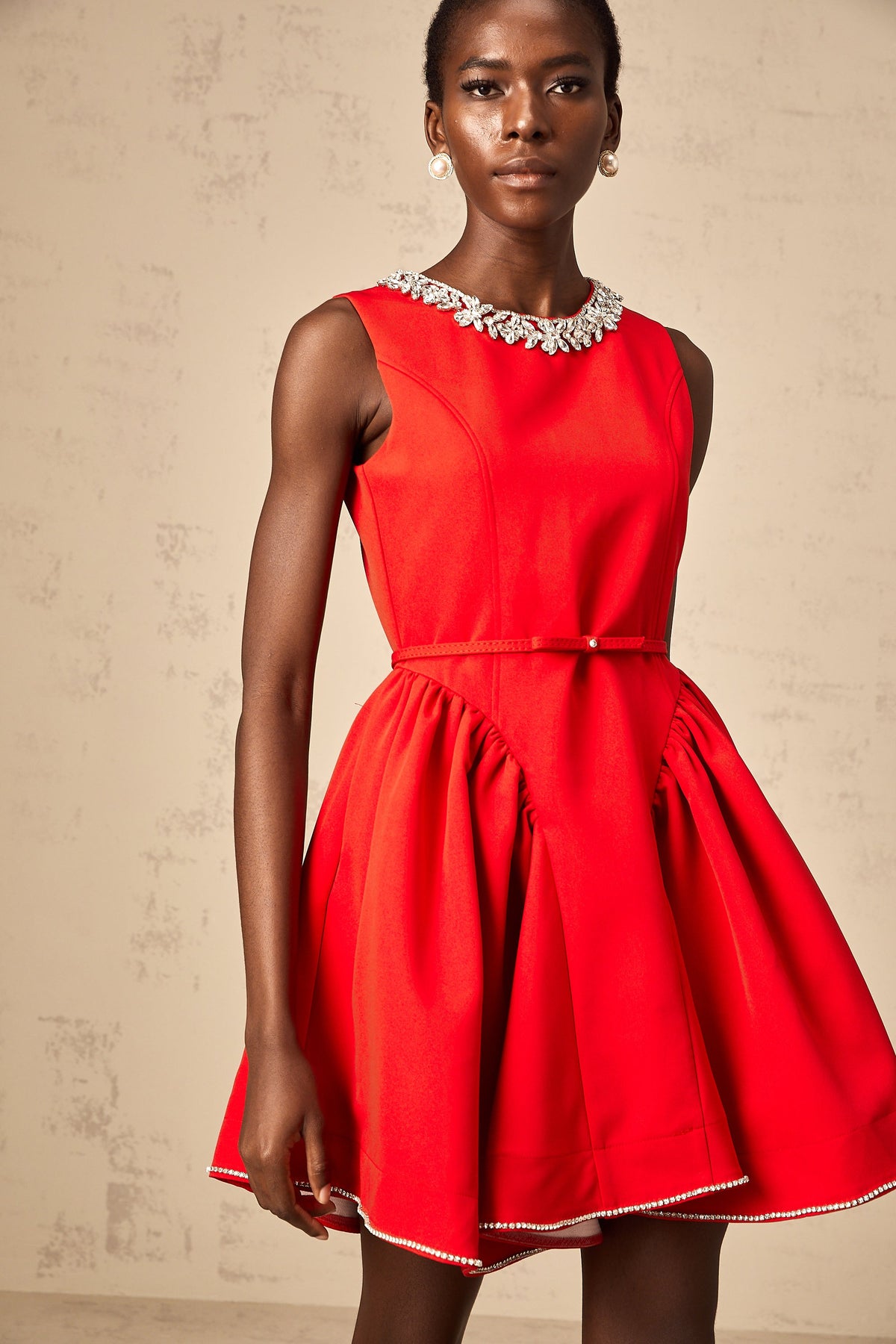 Léonie red embellished pleated mini dress