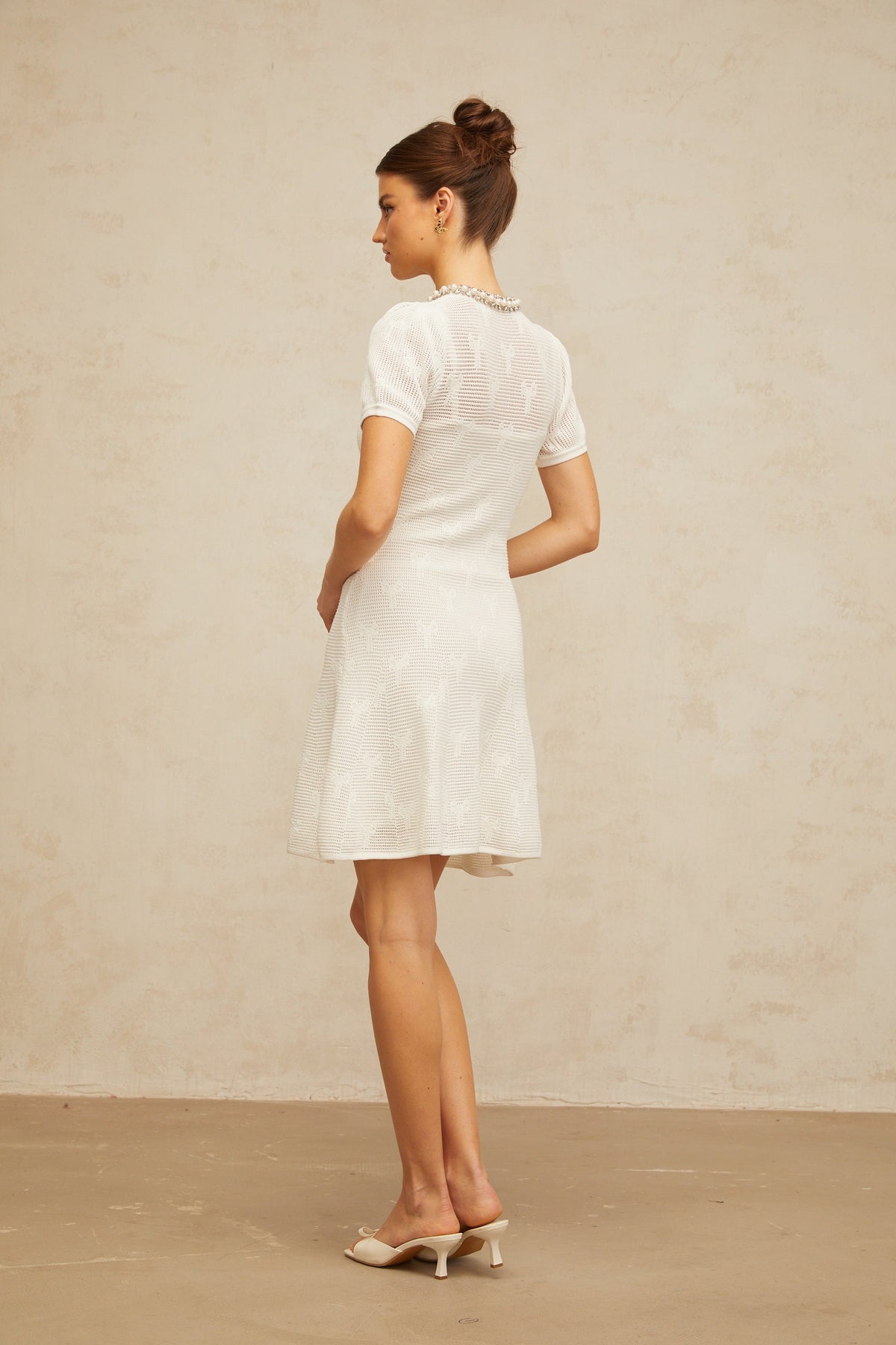 Marjolaine white embellished crochet-knit mini dress