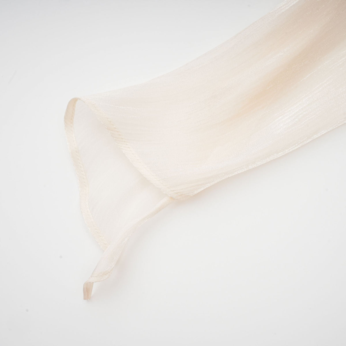 Eugénie fully-pleated ruffled mini dress in Neutrals