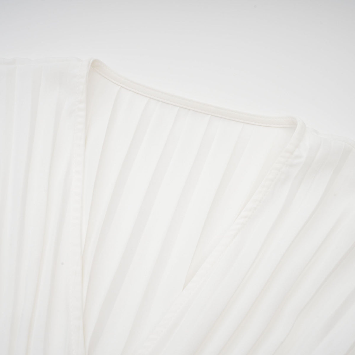 Claudette V-neck pleated mini dress