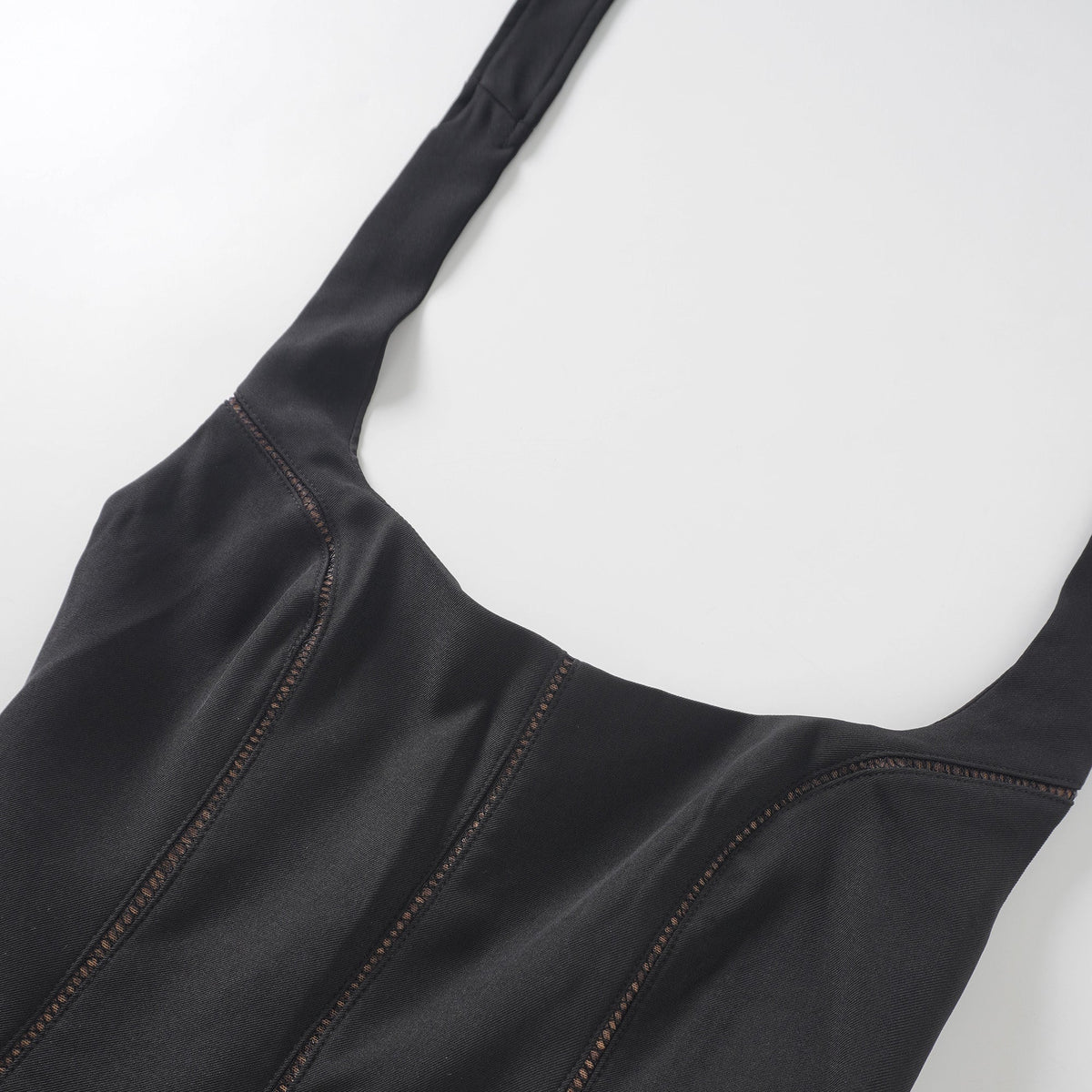 Quirine halterneck bow-detail mini dress in Black