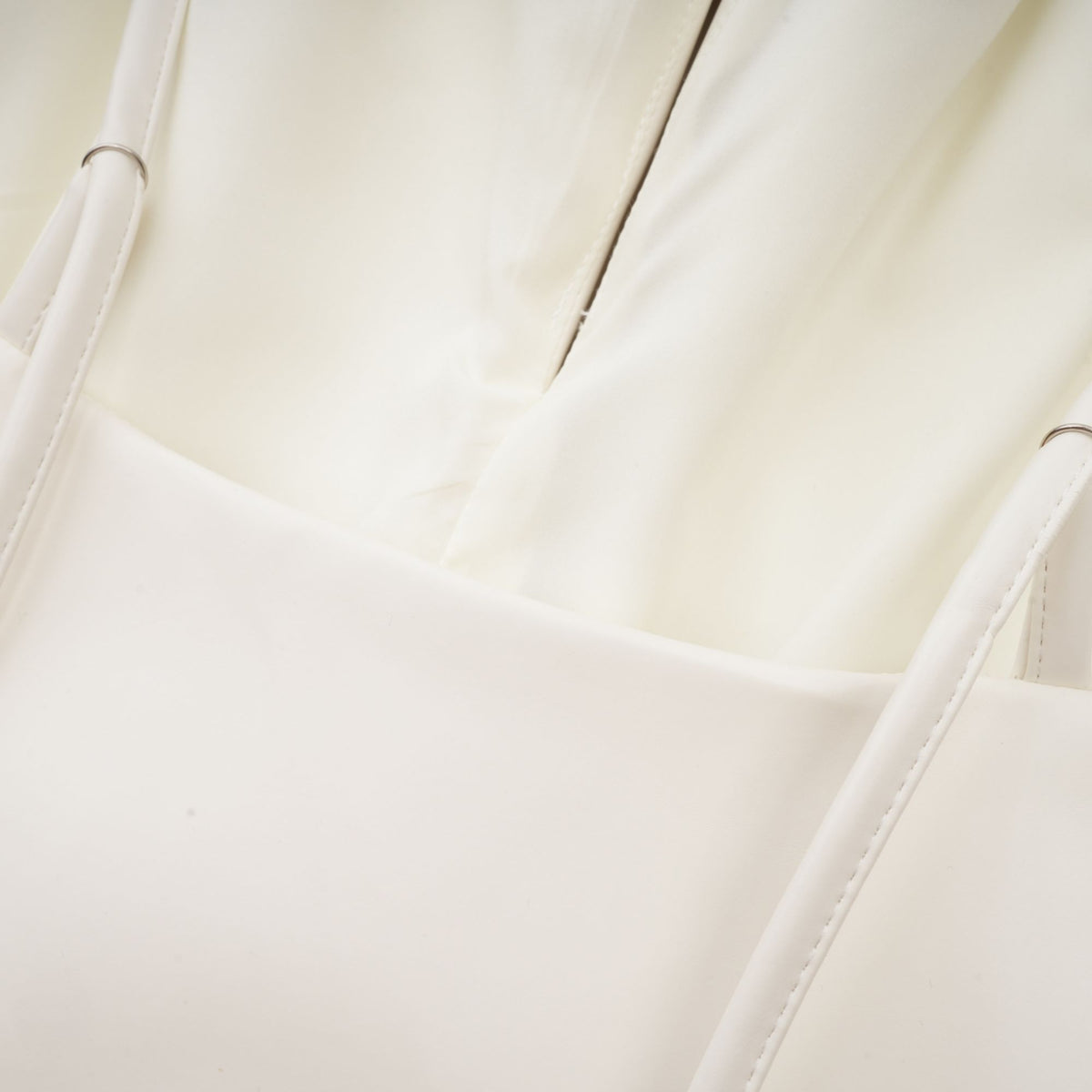 Sancia floral-appliqué leather top