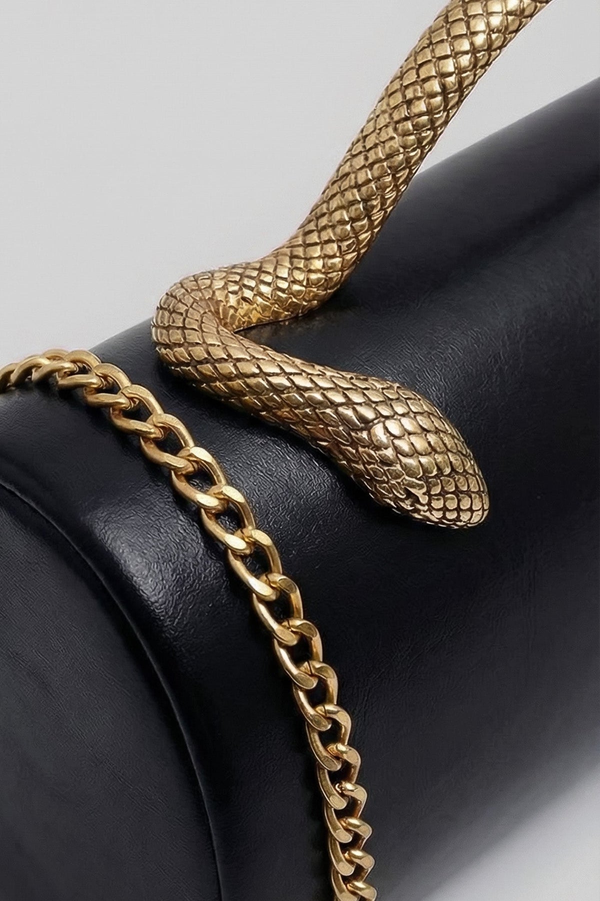 Structured Clutch Bag with Snake Handle And Gold Chain – Black