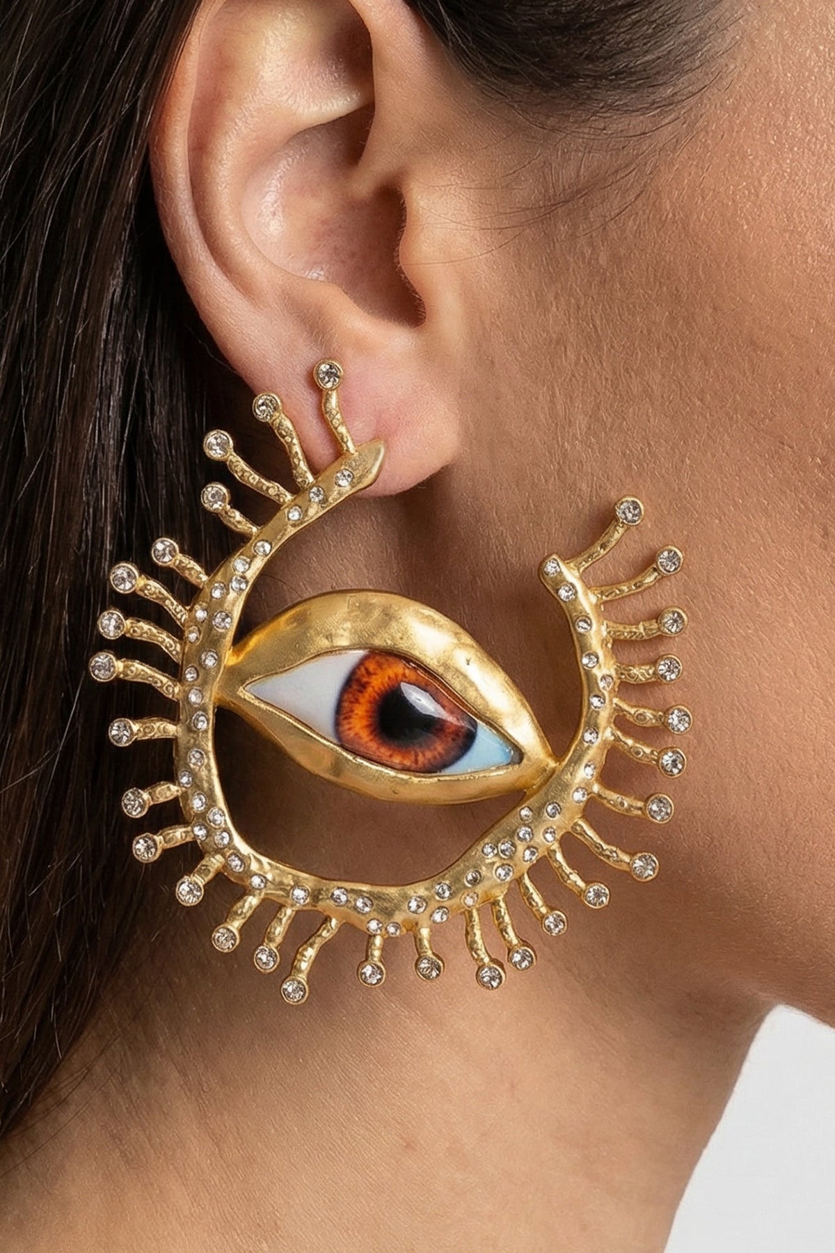 Statement Eye Stud Earrings with Crystal Ray Details – Gold