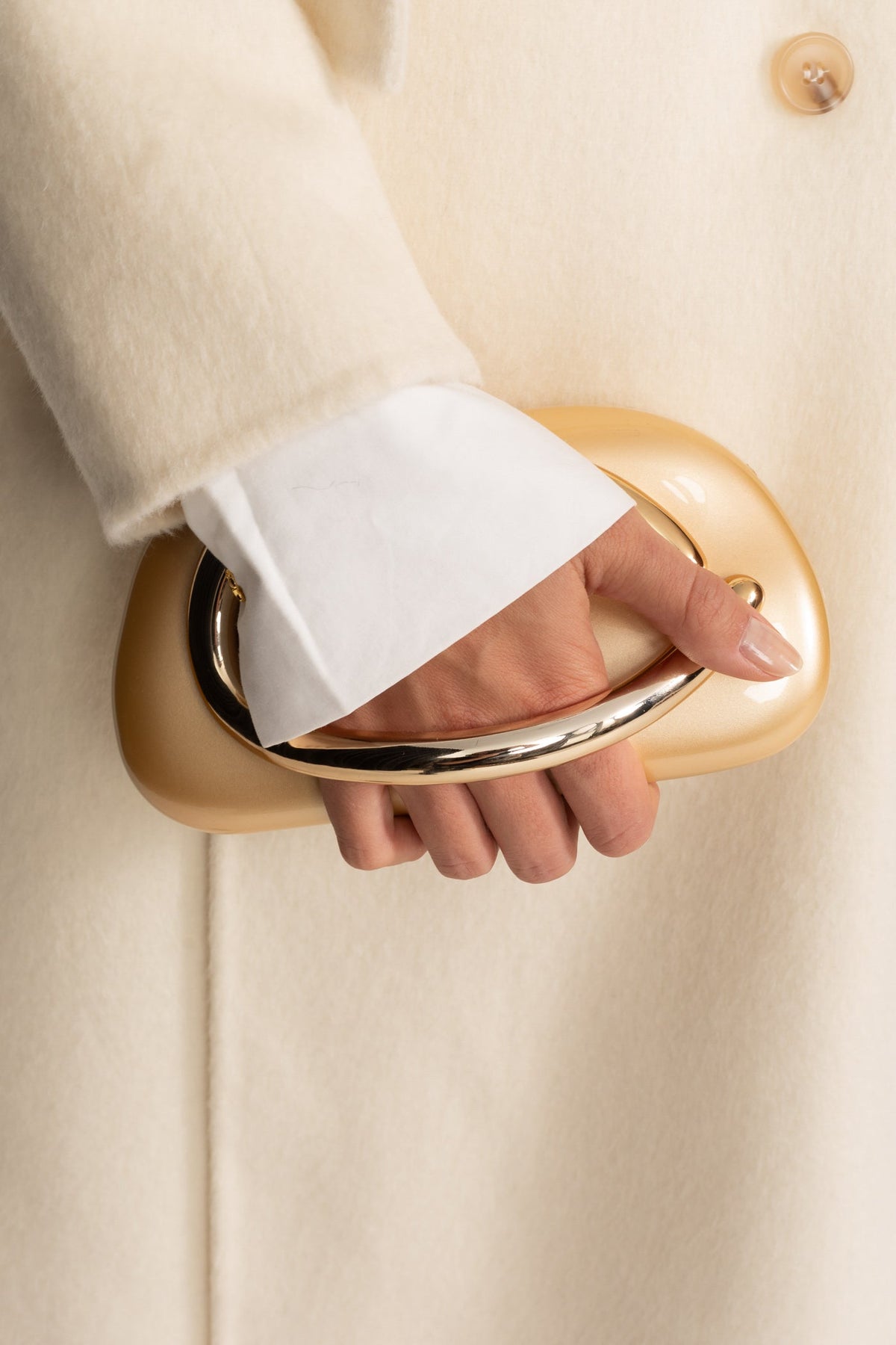 Clutch With Gold Sculptural Handle – Gold