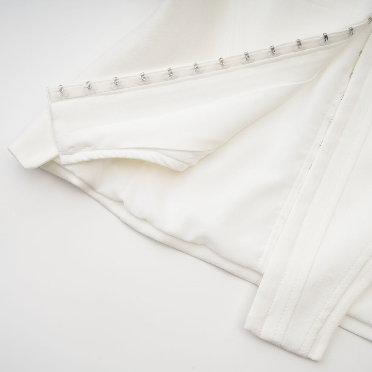 Yvette white long-sleeved corset top